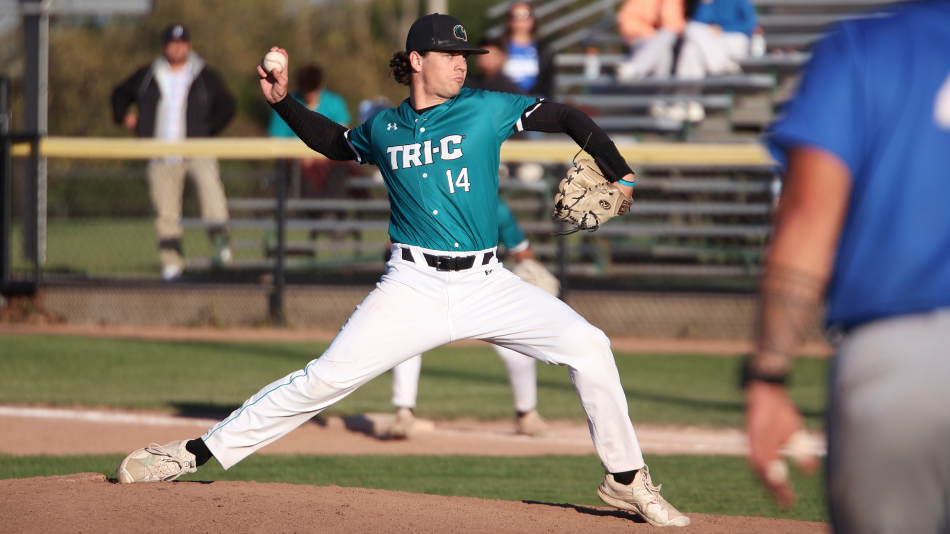 Pitcher Keagan Gilbride throwing a pitch